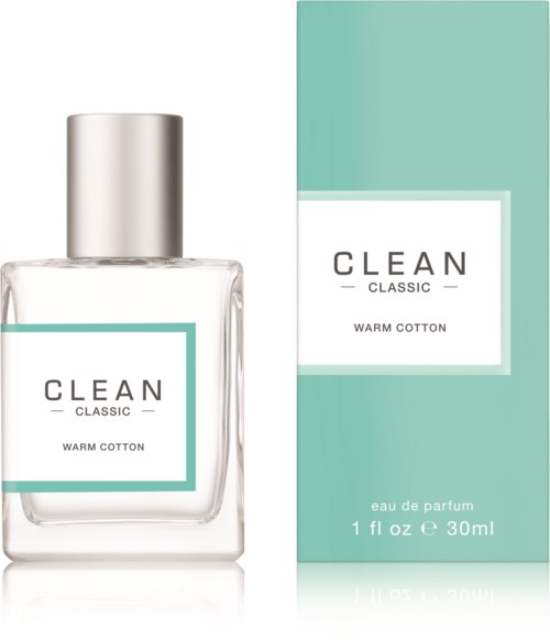 Een parfumfles met 'CLEAN CLASSIC WARM COTTON' en een bijpassend doosje, beide in wit en lichtblauwgroen.