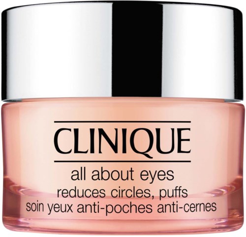 A small pink jar with a silver lid, labeled 'Clinique all about eyes' for reducing eye circles and puffiness.