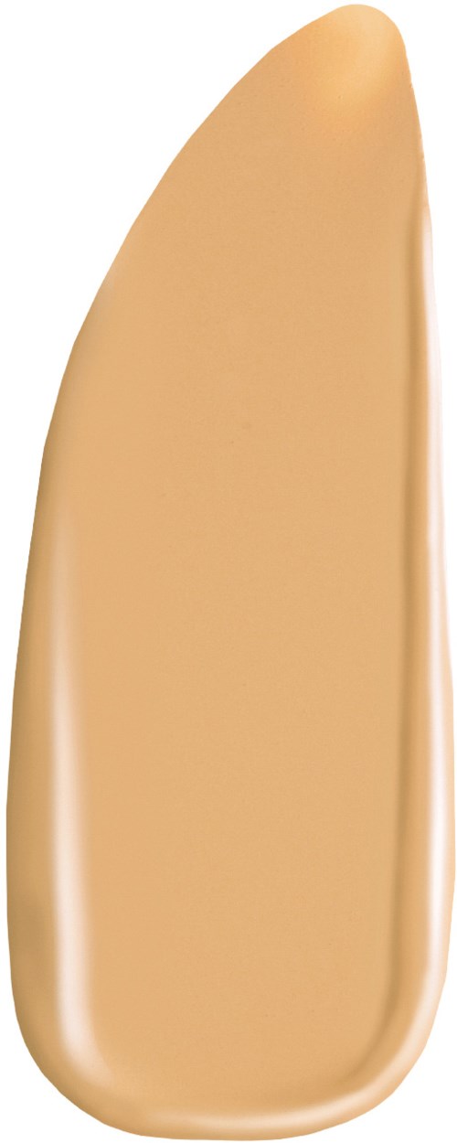 A beige makeup sponge with rounded edges, standing upright.