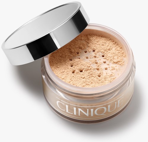 Een ronde container met beige los poeder en een zilveren deksel, gemarkeerd 'Clinique'.