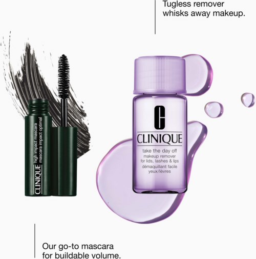 Clinique makeup remover bottle with purple caps and purple liquid, surrounded by drops of makeup remover.
