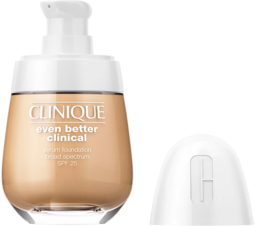 Eine Flasche Clinique Foundation mit Pumpenverschluss und eine weiße Dose oder Gerät daneben.