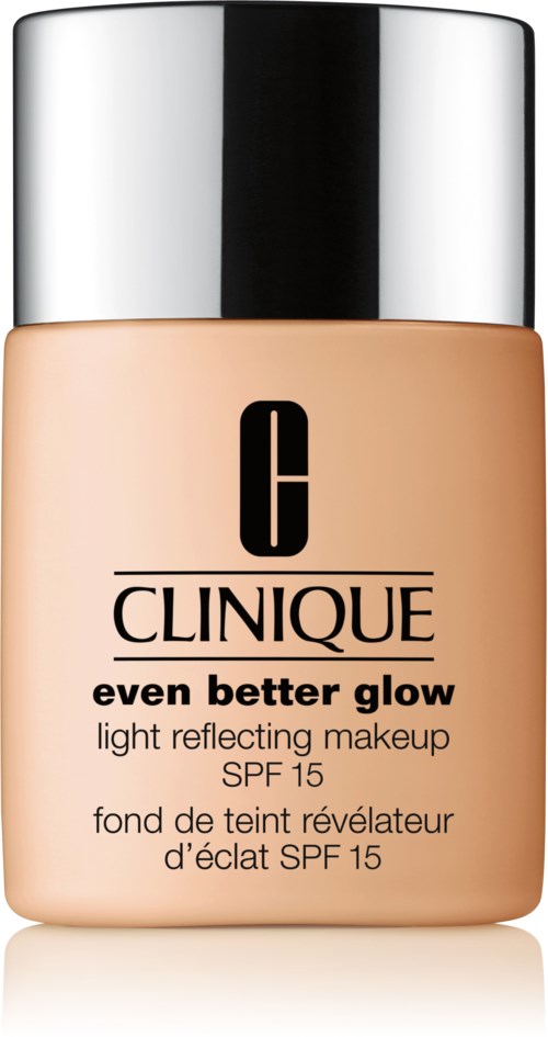 En flaska Clinique-foundation för glowing hud, med SPF 15, i en beige flaska med en silverlock.