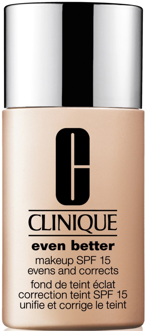 A Clinique makeup bottle labeled 'even better' with SPF 15, designed to improve skin tone.