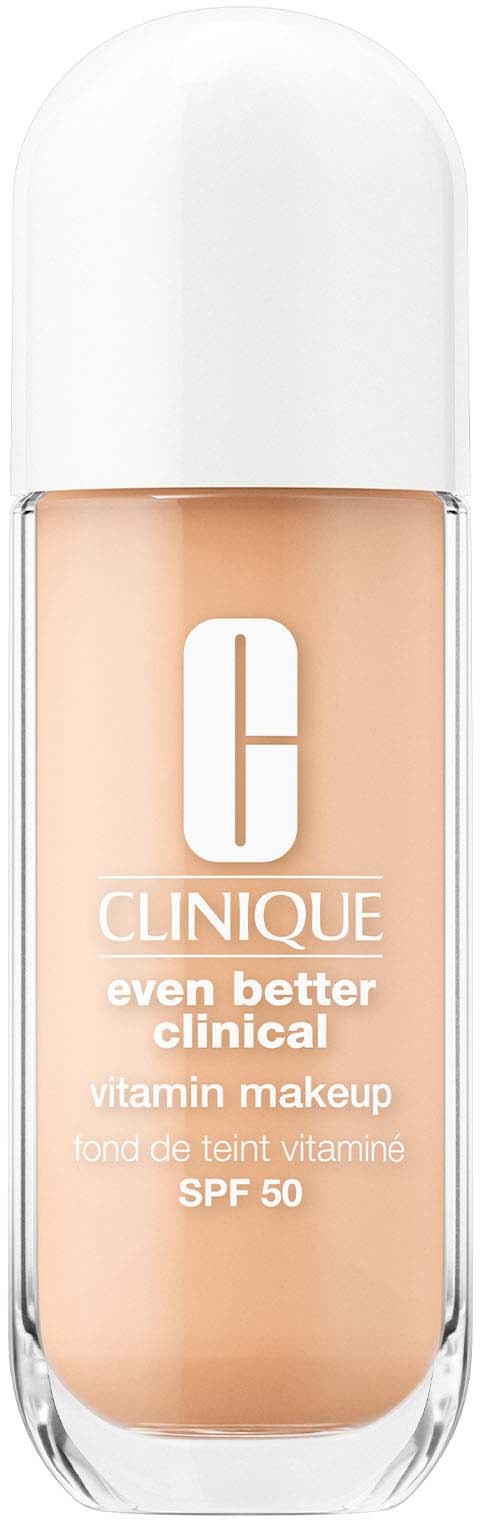 A bottle of Clinique foundation with SPF 50, titled 'even better clinical vitamin makeup,' in a clear and white container.