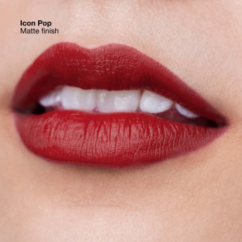 Close-up of lips with red lipstick, slightly parted showing teeth, labeled 'Icon Pop Matte finish'.