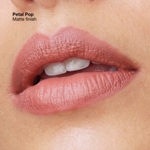 Close-up of lips with matte finish lipstick, showing slightly parted lips and teeth.