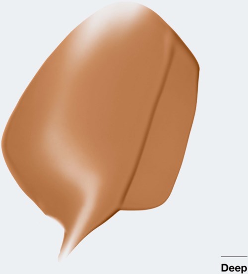 En brun glassstav på pinne med slät yta och ett bettmärke.
