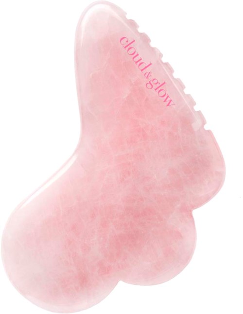 Een roze schoonheidsponge met "cloud glow" erop.