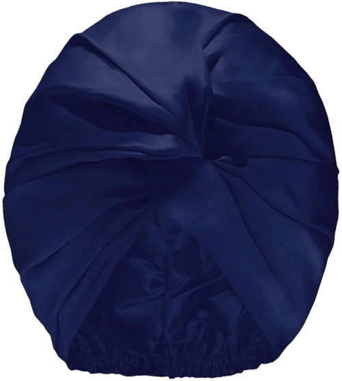 Een donkerblauwe slaapzak of zak, strak gewikkeld en rond boven.