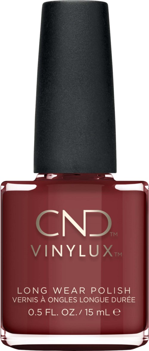 Eine Flasche dunkelroten Nagellacks mit schwarzen Deckel, beschriftet mit 'CND VINYLUX' und 'LONG WEAR POLISH'.