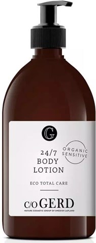 A brown bottle with a pump, containing organic body lotion labeled for sensitive skin, eco-friendly.