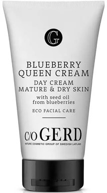 A white tube labeled Blueberry Queen Cream, with black cap, for mature and dry skin, ingredients include blueberry and seed oil.