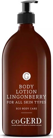 Brown bottle with a pump dispenser for body lotion, labeled for all skin types and eco-friendly. Mostly text.