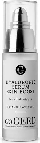 A white and silver bottle of hyaluronic serum for skin, labeled for all skin types, with a pump top.