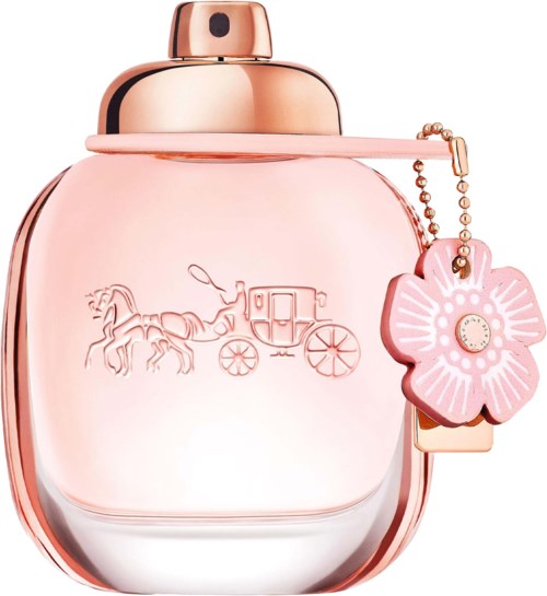 Pink perfume bottle with a flower-shaped charm hanging from it and a horse-drawn carriage embossed on the bottle.