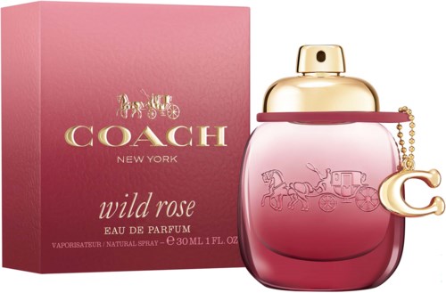 Pink and gold Coach Wild Rose perfume bottle with a chain and a pink box behind it.