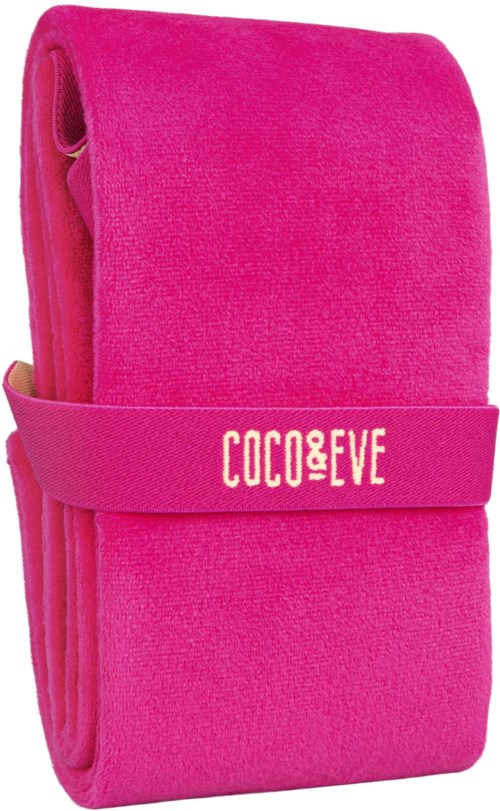 En rosa stoffveske med stropp som sier "COCO&EVE".