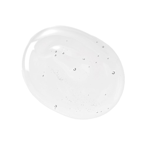 A clear gel or liquid with small bubbles inside, shaped like an oval.