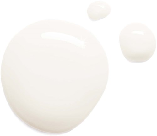 Three white eggs, one large and two smaller, are on a black surface.