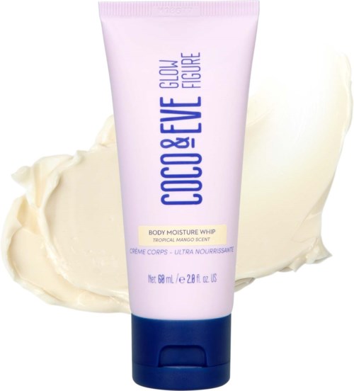 A tube of Coco & Eve Glow Body Moisture Whip with tropical mango scent, 86 mL, against a creamy background.