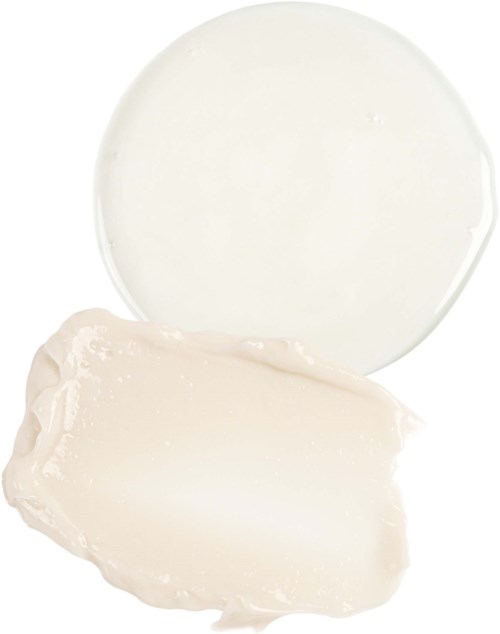 Een ronde witte container met witte crème of lotion, en een dotje van de crème ernaast.