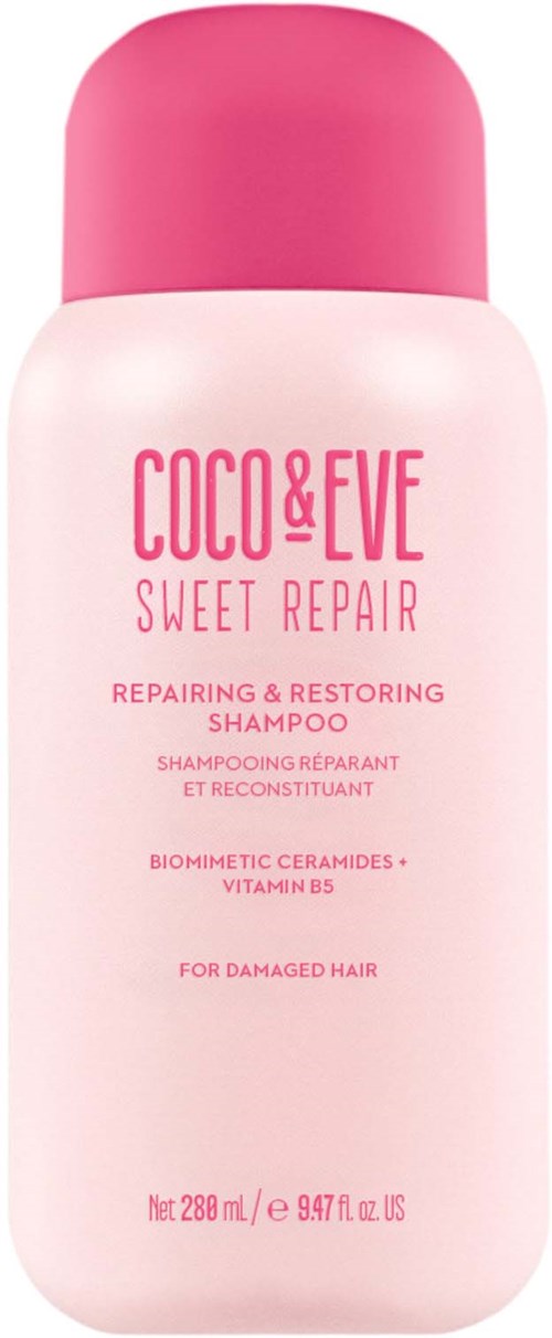 Valkoinen ja pinkki shampoo-pullo, jossa lukee 'Coco & Eve Sweet Repair' vahingoittuneelle hiuksille.