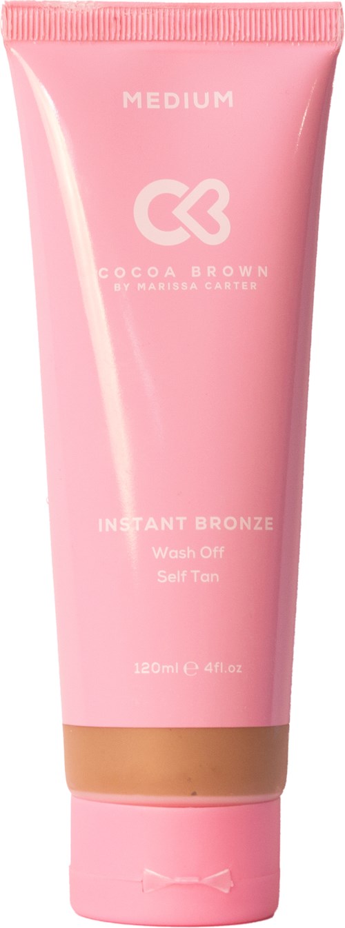Eine pinke Tube Coco & C BB-Creme mit braunem Streifen, für mittleren Farbton und sofortigen Bronzeneffekt.