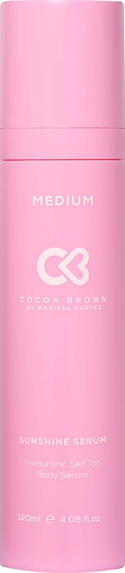 Eine pinke, zylindrische Flasche mit Text, darunter "Medium," "Cocoa Brown," und "Sunshine Serum."