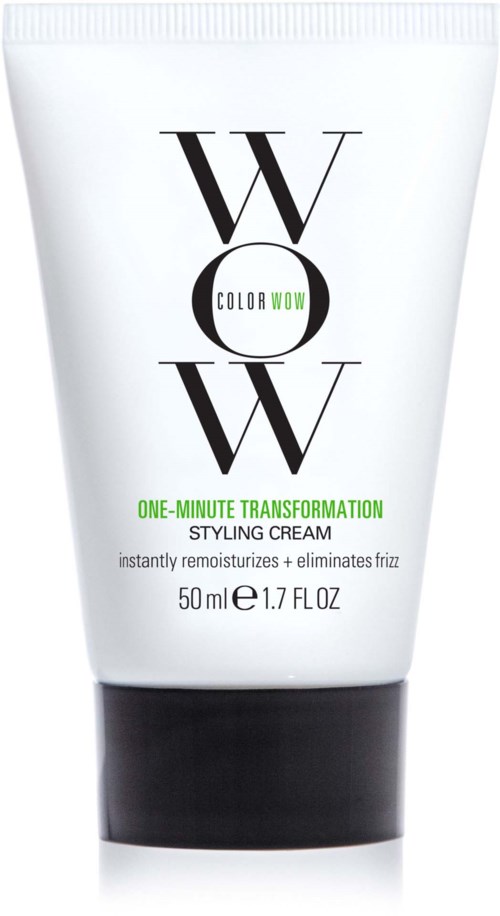 A white tube with black and green text, labeled as styling cream for hair, 50 ml.