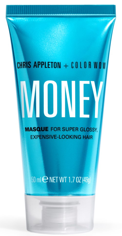 A blue tube of hair mask with bold white and black text, promoting shiny, expensive-looking hair.