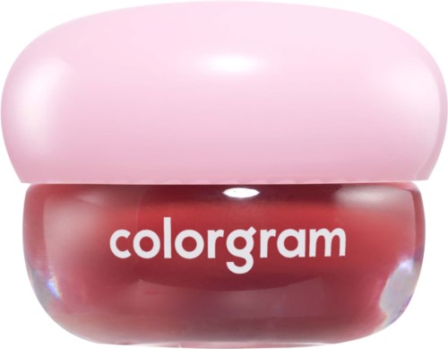 Liten krukke med rosa lip balm og rosa lokk, med merket colorgram på krukken.