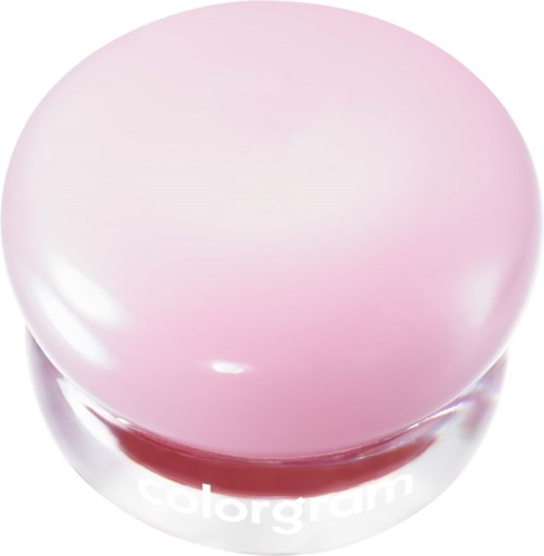 En rund, rosa og hvit kremkopp med ordet colorgam.
