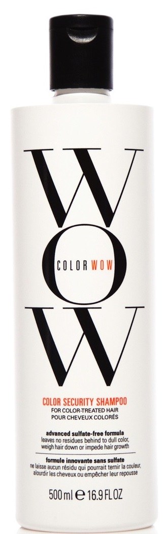 En vit flaska med svart lock, märkt 'WOW COLOR' och 'COLOR SECURITY SHAMPOO' för färgat hår.