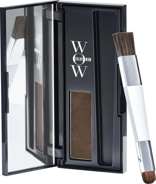 A black makeup palette with a mirror and a brush inside. The palette is open, showing compartments for products.