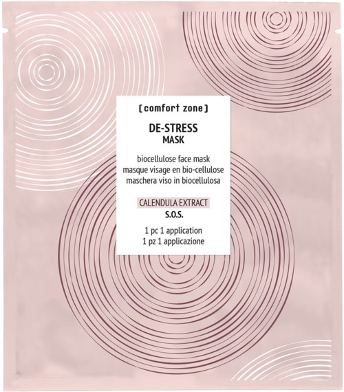 A pink face mask package with circular decorative patterns and text about calming dose and calendula extract.