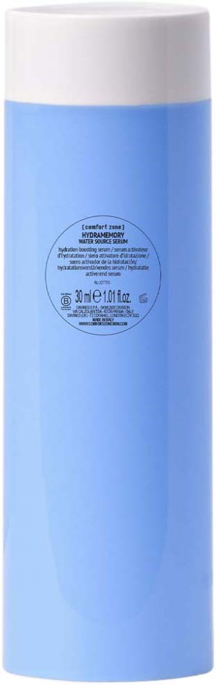 A tall blue bottle with a white cap, likely a shampoo or body wash container.