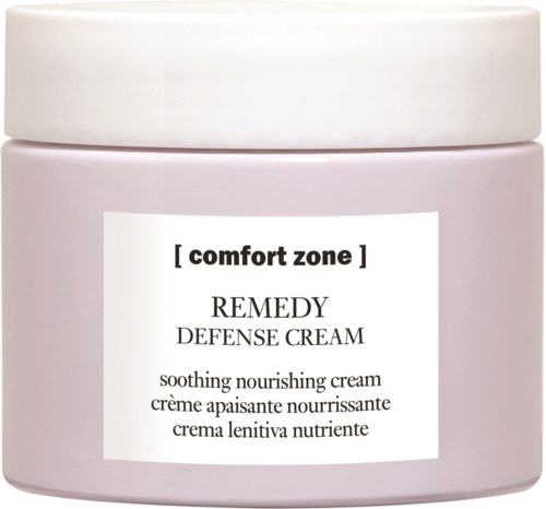 Vaaleanpunainen rasia, jossa lukee 'Comfort Zone Remedy Defense Cream' rauhoittavaan ja ravitsevaan ihonhoitoon.
