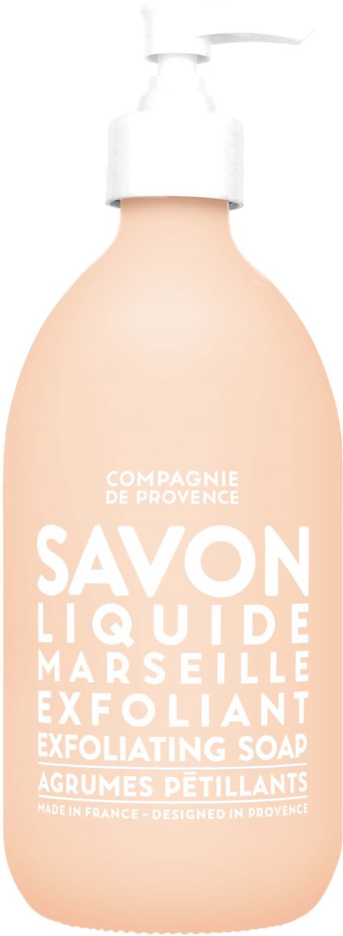 Liquid soap with exfoliating properties, in a pastel pink bottle with a pump. Text mentions Provence, Marseille, and citrus scent.