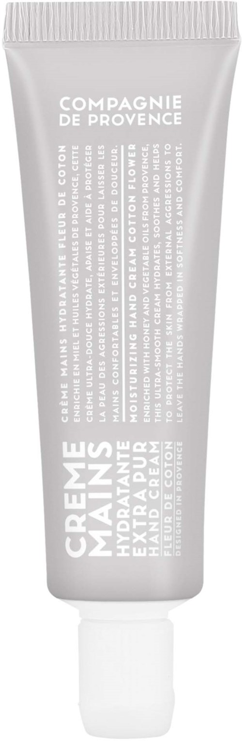 A white tube of cream with gray and white text, labeled 'Compagnie de Provence' and 'Crème Mains' for hand care.