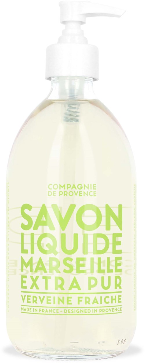 A clear liquid soap in a transparent bottle with a white pump, labeled in green French text for Marseille liquid soap.