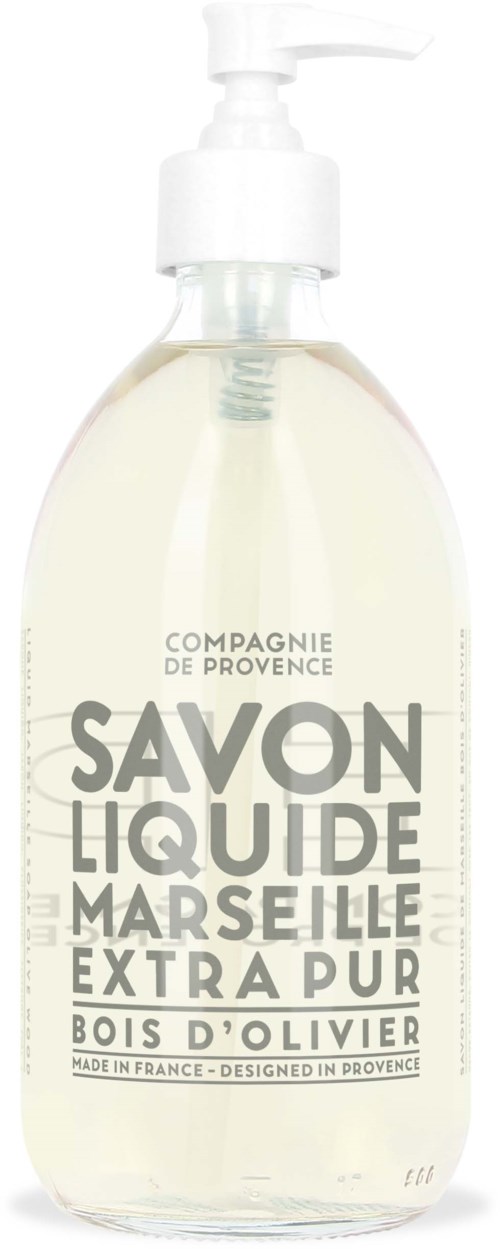 A clear liquid in a pump bottle labeled as Marseille soap made with olive oil, in French.