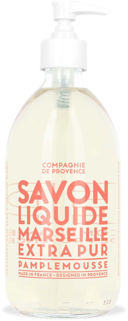A clear liquid soap in a pump bottle with pink and orange text, from Marseille, France, named Pamplemousse.