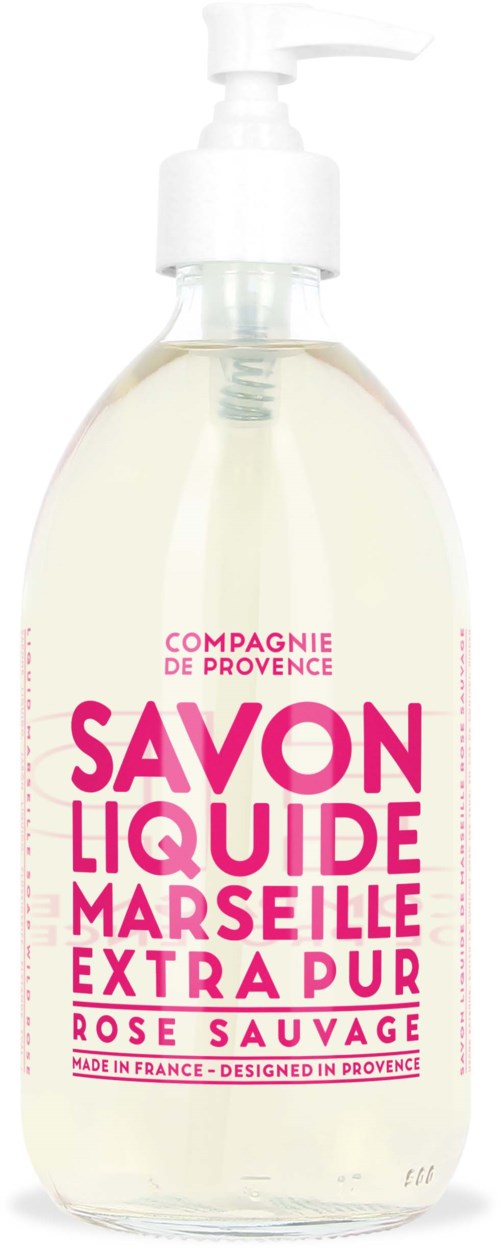 A clear liquid soap bottle with a pump, labeled in pink and white, indicates it is for hand washing.