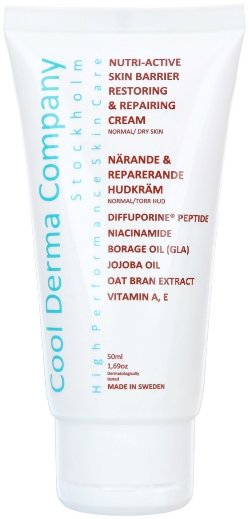 A white tube with blue and red text describing skincare ingredients and purpose for normal or dry skin.