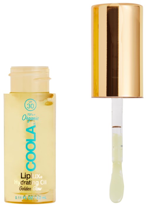 Merket flaske av CoaLip Hydrating Oil med pipette og gullhette. Flasken er lysegul med blå tekst.