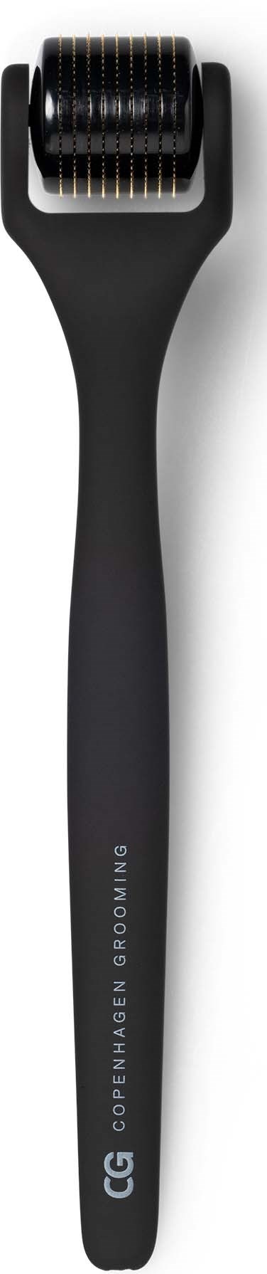 A black handled skincare tool with a rolling metal part at the top, used for facial massages.