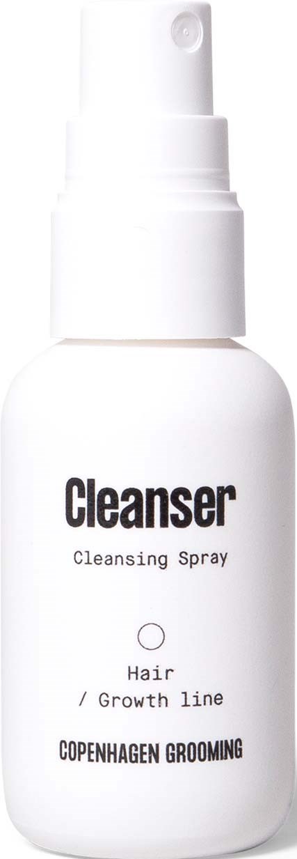 White spray bottle labeled for hair and growth line, from Copenhagen Grooming.