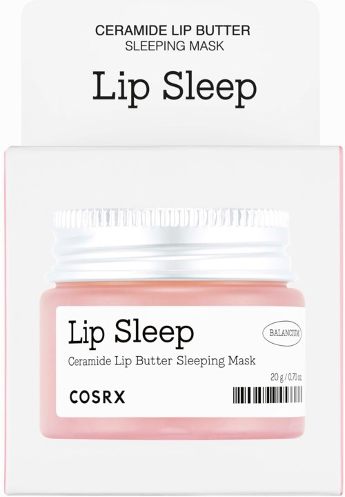 Ein kleiner pinker Tiegel mit Lippenbalsam, beschriftet 'Lip Sleep', vor seiner Verpackung.