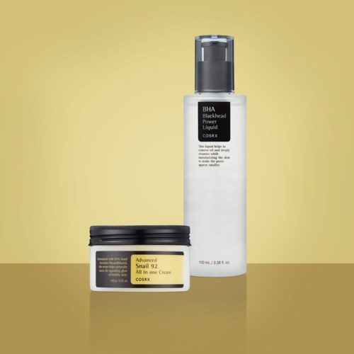 Two skincare products, a tall bottle and a small jar, placed on a two-tone background.